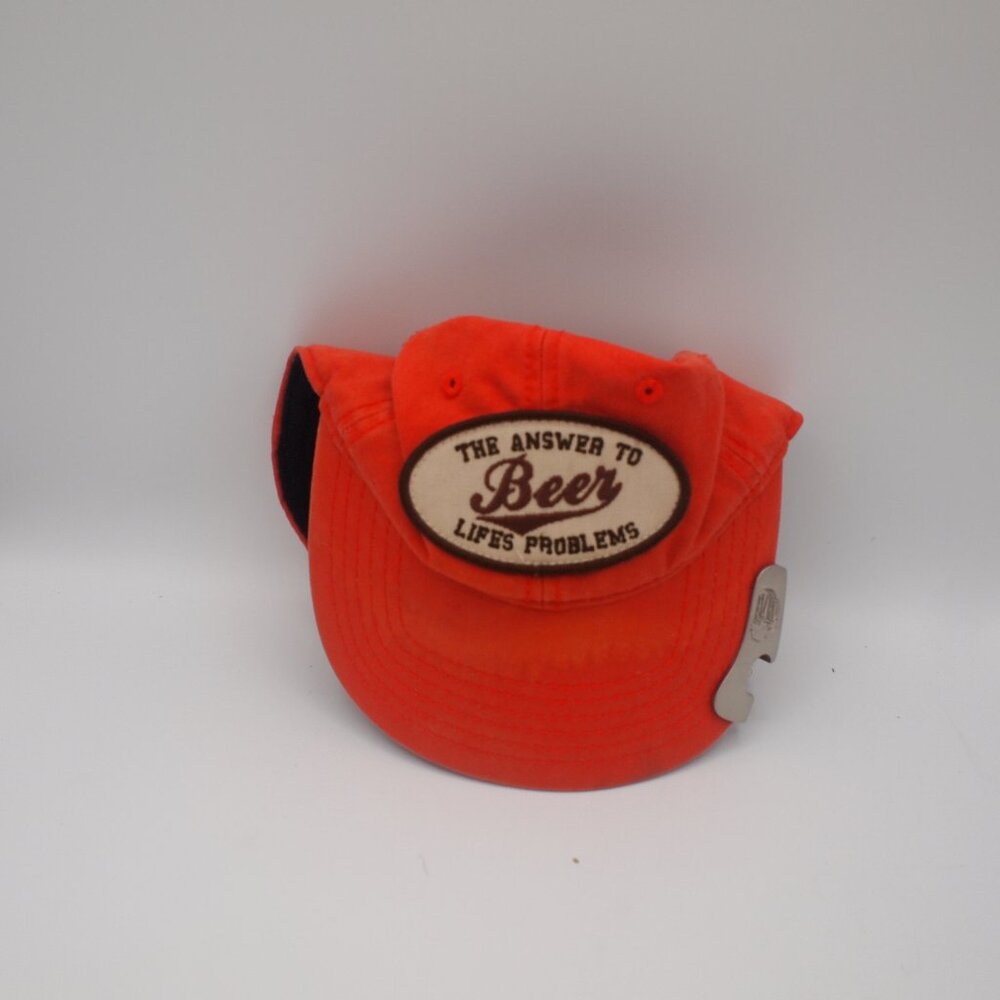 The answer to life's problem:Beer cap with attached bottle opener